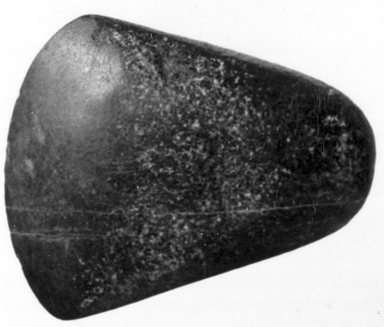  <em>Axe Head</em>, ca. 4400–2170 B.C.E. Granite, 2 3/16 x Length 2 11/16 in. (5.5 x 6.8 cm). Brooklyn Museum, Charles Edwin Wilbour Fund, 07.447.1001. Creative Commons-BY (Photo: , CUR.07.447.1001_NegID_07.447.965_GRPA_print_cropped_bw.jpg)