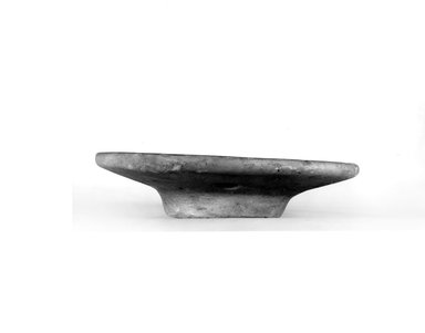  <em>Offering Table</em>, ca. 3100-2675 B.C.E. Limestone, 2 5/16 x Diam. 9 13/16 in. (5.9 x 24.9 cm). Brooklyn Museum, Charles Edwin Wilbour Fund, 07.447.10. Creative Commons-BY (Photo: Brooklyn Museum, CUR.07.447.10_NegA_print_bw.jpg)