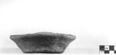  <em>Crudely Shaped Saucer</em>, ca. 3100–2675 B.C.E. Clay, height: 1 1/4 in. Brooklyn Museum, Charles Edwin Wilbour Fund, 07.447.307. Creative Commons-BY (Photo: Brooklyn Museum, CUR.07.447.307_NegA_print_bw.jpg)