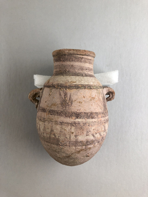  <em>Ovoid-Handled Jar</em>, ca. 1539-1190 B.C.E. Clay, pigment, 6 × 3 1/2 × 4 1/8 in. (15.3 × 8.9 × 10.5 cm). Brooklyn Museum, Charles Edwin Wilbour Fund, 07.447.439. Creative Commons-BY (Photo: Brooklyn Museum, CUR.07.447.439_view01.jpg)