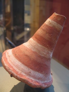  <em>Funnel-Shaped Lid</em>, ca. 1630–1539 B.C.E. Clay, pigment, 4 5/8 x Diam. 4 5/16 in. (11.8 x 11 cm). Brooklyn Museum, Charles Edwin Wilbour Fund, 07.447.461. Creative Commons-BY (Photo: Brooklyn Museum, CUR.07.447.461_erg2.jpg)