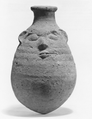  <em>Bes Jar</em>, 664-332 B.C.E. Clay, pigment, 7 11/16 × 4 3/16 in. (19.5 × 10.6 cm). Brooklyn Museum, Charles Edwin Wilbour Fund, 07.447.482. Creative Commons-BY (Photo: Brooklyn Museum, CUR.07.447.482_negA_print.jpg)
