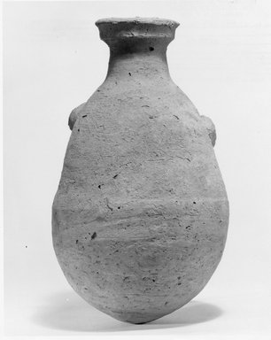  <em>Bottle with Grotesque Face</em>. Clay, 7 9/16 x Greatest diam. 4 5/16 in. (19.2 x 11 cm). Brooklyn Museum, Charles Edwin Wilbour Fund, 07.447.483. Creative Commons-BY (Photo: Brooklyn Museum, CUR.07.447.483_negC_print.jpg)