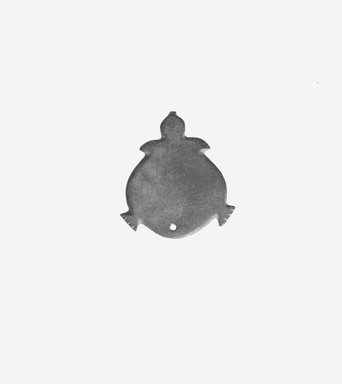  <em>Palette or Amulet in the Shape of a Turtle</em>, ca. 3500-3300 B.C.E. Graywacke, 1 15/16 x 1 3/4 in. (5 x 4.4 cm). Brooklyn Museum, Charles Edwin Wilbour Fund, 07.447.619. Creative Commons-BY (Photo: Brooklyn Museum, CUR.07.447.619_NegA_print_bw.jpg)