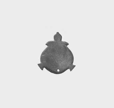  <em>Palette or Amulet in the Shape of a Turtle</em>, ca. 3500-3300 B.C.E. Graywacke, 1 15/16 x 1 3/4 in. (5 x 4.4 cm). Brooklyn Museum, Charles Edwin Wilbour Fund, 07.447.619. Creative Commons-BY (Photo: Brooklyn Museum, CUR.07.447.619_NegB_print_bw.jpg)