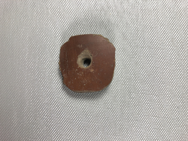  <em>Nine Perforated Discs</em>, ca. 4400-2675 B.C.E. Clay, 07.447.790: Diam. 1 11/16 in. (4.3 cm). Brooklyn Museum, Charles Edwin Wilbour Fund, 07.447.790a-i. Creative Commons-BY (Photo: , CUR.07.447.790e_view01.jpg)