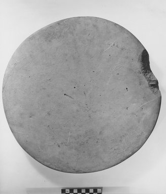  <em>Large Offering Table</em>, ca. 3100-2675 B.C.E. Limestone, 1 1/8 x Diam. 15 in. (2.8 x 38.1 cm). Brooklyn Museum, Charles Edwin Wilbour Fund, 07.447.7. Creative Commons-BY (Photo: Brooklyn Museum, CUR.07.447.7_NegB_print_bw.jpg)