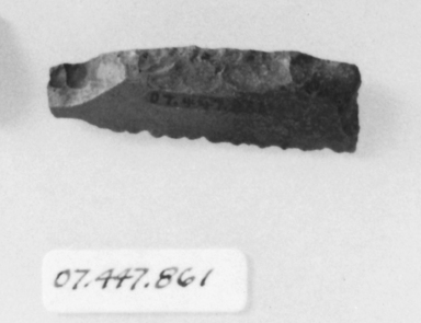  <em>Sickle Blade</em>, ca. 4400–3100 B.C.E. Flint, 5/8 x 1 15/16 in. (1.6 x 4.9 cm). Brooklyn Museum, Charles Edwin Wilbour Fund, 07.447.861. Creative Commons-BY (Photo: , CUR.07.447.861_NegID_07.447.810GRPA_print_cropped_bw.jpg)