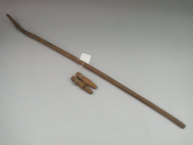 Hupa. <em>Tied Billet Game, Stick and Pair of Billets</em>. Wood, hide, Stick: 5/8 × 7/8 × 31 in. (1.6 × 2.2 × 78.7 cm). Brooklyn Museum, By exchange, 07.468.9336a-c. Creative Commons-BY (Photo: , CUR.07.468.9336a-c.jpg)