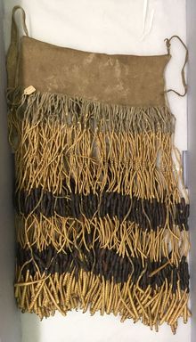 Possibly Shasta. <em>Apron with Fringe</em>, 19th century. Hide, bear grass, shell, pine nuts, 25 9/16 x 13 3/4 in.  (65.0 x 35.0 cm). Brooklyn Museum, Brooklyn Museum Collection, 08.469. Creative Commons-BY (Photo: Brooklyn Museum, CUR.08.469_view01.jpg)