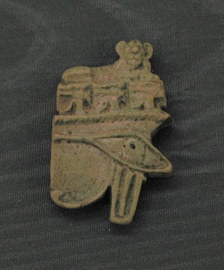  <em>Wadjet-eye and Lioness Amulet</em>, 664–332 B.C.E. Faience, 1 1/8 x 3/16 x 11/16 in. (2.8 x 0.5 x 1.8 cm). Brooklyn Museum, Charles Edwin Wilbour Fund, 08.480.100. Creative Commons-BY (Photo: Brooklyn Museum, CUR.08.480.100.jpg)