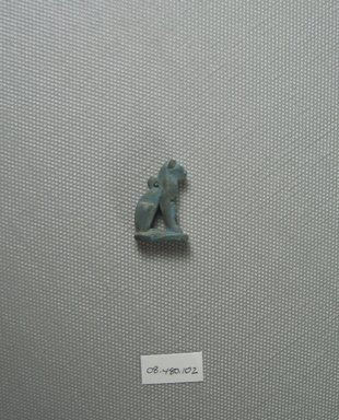  <em>Amulet of a Cat with Kitten</em>, ca. 1075-30 B.C.E. Faience, 1 x 11/16 in. (2.5 x 1.7 cm). Brooklyn Museum, Charles Edwin Wilbour Fund, 08.480.102. Creative Commons-BY (Photo: Brooklyn Museum, CUR.08.480.102_view2.jpg)