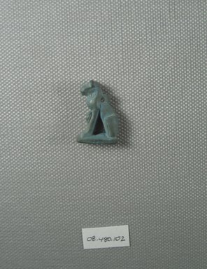  <em>Amulet of a Cat with Kitten</em>, ca. 1075-30 B.C.E. Faience, 1 x 11/16 in. (2.5 x 1.7 cm). Brooklyn Museum, Charles Edwin Wilbour Fund, 08.480.102. Creative Commons-BY (Photo: Brooklyn Museum, CUR.08.480.102_view3.jpg)