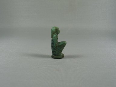  <em>Amulet of the Goddess Ma'at</em>, 332-31 B.C.E. Feldspar, 1 1/2 × 11/16 × 9/16 in. (3.8 × 1.8 × 1.5 cm). Brooklyn Museum, Charles Edwin Wilbour Fund, 08.480.108. Creative Commons-BY (Photo: , CUR.08.480.108_view02.jpg)