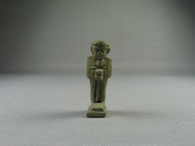  <em>Figure of Ptah as Amulet</em>, 332 B.C.E.-395 C.E. Faience, 1 9/16 x 1/2 in. (3.9 x 1.3 cm)H 3.8 cm. Brooklyn Museum, Charles Edwin Wilbour Fund, 08.480.152. Creative Commons-BY (Photo: Brooklyn Museum, CUR.08.480.152_view1.jpg)