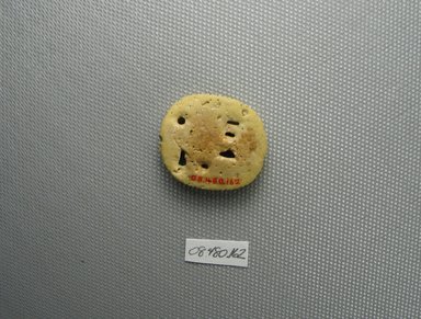  <em>Wadjet-eye Amulet</em>. Faience, 1 x 1/4 x 1 1/8 in. (2.6 x 0.6 x 2.9 cm). Brooklyn Museum, Charles Edwin Wilbour Fund, 08.480.162. Creative Commons-BY (Photo: Brooklyn Museum, CUR.08.480.162_view2.jpg)