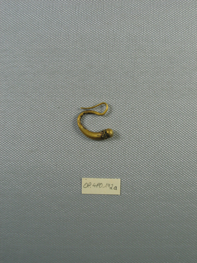 Roman. <em>Pair of Earrings</em>, 1-300 C.E. Gold, 08.480.192a: 1/4 x 7/8 in. (0.6 x 2.3 cm). Brooklyn Museum, Charles Edwin Wilbour Fund, 08.480.192a-b. Creative Commons-BY (Photo: , CUR.08.480.192a_view01.jpg)
