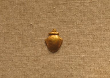  <em>Amulet in the Form of a Heart</em>, ca. 664–30 B.C.E. Sheet gold, 13/16 x 5/8 in. (2.1 x 1.6 cm). Brooklyn Museum, Charles Edwin Wilbour Fund, 08.480.212. Creative Commons-BY (Photo: Brooklyn Museum, CUR.08.480.212_wwg8.jpg)