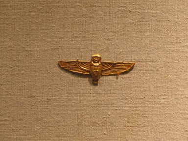  <em>Amulet Representing the Ba-bird</em>, ca. 664-30 B.C.E. Gold, 11/16 x 1 3/4 in. (1.7 x 4.5 cm). Brooklyn Museum, Charles Edwin Wilbour Fund, 08.480.213. Creative Commons-BY (Photo: Brooklyn Museum, CUR.08.480.213_wwg8.jpg)