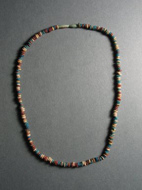  <em>String of Disk Beads</em>, ca. 1539-1292 B.C.E. Faience, turquoise (?), 3/16 x 19 1/2 in. (0.5 x 49.5 cm). Brooklyn Museum, Charles Edwin Wilbour Fund, 08.480.240. Creative Commons-BY (Photo: , CUR.08.480.240_view01.jpg)