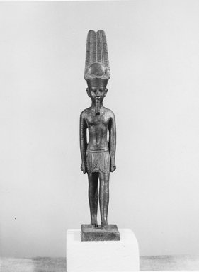  <em>Standing Statuette of Amon</em>, 332 B.C.E.-30 C.E. Bronze, 4 x 11/16 in. (10.2 x 1.8 cm). Brooklyn Museum, Charles Edwin Wilbour Fund, 08.480.43. Creative Commons-BY (Photo: Brooklyn Museum, CUR.08.480.43_negB_bw.jpg)