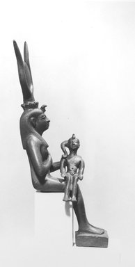  <em>Isis Nursing Horus</em>, 332 B.C.E.–30 C.E. Bronze, 8 3/4 x 2 3/4 x 2 1/8 in. (22.2 x 7 x 5.4 cm). Brooklyn Museum, Charles Edwin Wilbour Fund, 08.480.49. Creative Commons-BY (Photo: Brooklyn Museum, CUR.08.480.49_NegB_print_bw.jpg)
