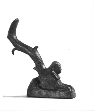 Graeco-Egyptian. <em>Reclining Sphinx</em>, 332-ca. 31 B.C.E. Bronze, 4 1/2 x 3/4 x 2 3/4 in. (11.5 x 1.9 x 7 cm). Brooklyn Museum, Charles Edwin Wilbour Fund, 08.480.51. Creative Commons-BY (Photo: Brooklyn Museum, CUR.08.480.51_NegA_print_bw.jpg)