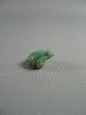  <em>Figure of Frog</em>. Feldspar, 1/2 in. (1.2 cm). Brooklyn Museum, Charles Edwin Wilbour Fund, 08.480.79. Creative Commons-BY (Photo: Brooklyn Museum, CUR.08.480.79_View2.jpg)
