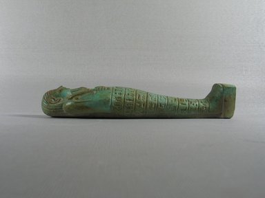 <em>Ushabti of the Priest of Nefertem</em>, 664-525 B.C.E. Faience, Height 8 in. (20.3 cm). Brooklyn Museum, Charles Edwin Wilbour Fund, 08.480.9. Creative Commons-BY (Photo: Brooklyn Museum, CUR.08.480.9_view2.jpg)