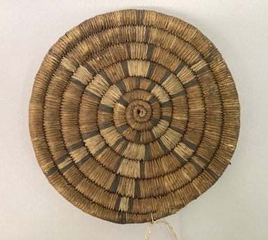 Hopi Pueblo. <em>Basketry plate</em>. Plant fiber, pigments, 5 7/8 x 13/16in. (15 x 2cm). Brooklyn Museum, Museum Expedition 1908, Museum Collection Fund, 08.491.8965. Creative Commons-BY (Photo: Brooklyn Museum, CUR.08.491.8965_view01.jpg)