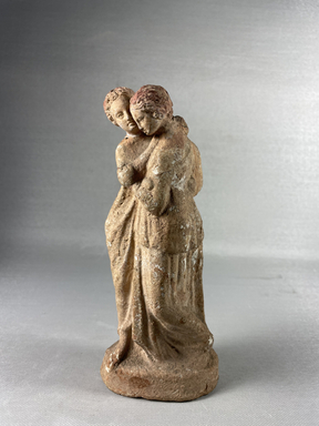 Possibly Greek. <em>Young Man and Woman</em>. Terracotta, pigment, 7 13/16 × 3 3/8 × 1 15/16 in. (19.8 × 8.5 × 5 cm). Brooklyn Museum, Gift of A. Augustus Healy, 09.22. Creative Commons-BY (Photo: Brooklyn Museum, CUR.09.22_view01.jpeg)