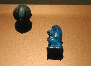  <em>Game Piece in Form of an Ape</em>, ca. 1539-1390 B.C.E. Faience, 1 7/8 x 1 1/8 in. (4.7 x 2.8 cm). Brooklyn Museum, Charles Edwin Wilbour Fund, 36.125. Creative Commons-BY (Photo: , CUR.09.879_36.125_erg456.jpg)