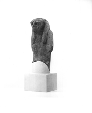  <em>Fragmentary Statuette of Qebehsenuef</em>. Stone, glaze, 6 1/4 x 2 9/16 in. (15.8 x 6.5 cm). Brooklyn Museum, Museum Collection Fund, 09.880. Creative Commons-BY (Photo: Brooklyn Museum, CUR.09.880_NegA_print_bw.jpg)