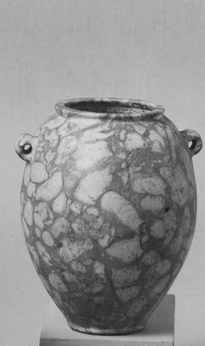  <em>Small Urn with Loop Handles</em>. Breccia, 2 15/16 x 2 7/16 x 2 9/16 in. (7.5 x 6.2 x 6.5 cm). Brooklyn Museum, Charles Edwin Wilbour Fund, 09.889.10. Creative Commons-BY (Photo: Brooklyn Museum, CUR.09.889.10_NegID_07.447.190_GRPA_print_cropped_bw.jpg)