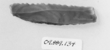  <em>Saw</em>, ca. 4400-2675 B.C.E. Flint, 11/16 x 2 13/16 in. (1.7 x 7.1 cm). Brooklyn Museum, Charles Edwin Wilbour Fund, 09.889.134. Creative Commons-BY (Photo: , CUR.09.889.134_NegID_07.447.810GRPA_print_cropped_bw.jpg)