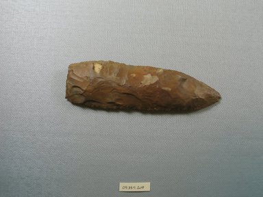  <em>Spear Head</em>, ca. 3800-3500 B.C.E. Flint, 1 9/16 x 1/2 x 5 5/8 in. (4 x 1.2 x 14.3 cm). Brooklyn Museum, Charles Edwin Wilbour Fund, 09.889.209. Creative Commons-BY (Photo: Brooklyn Museum, CUR.09.889.209_overall.jpg)