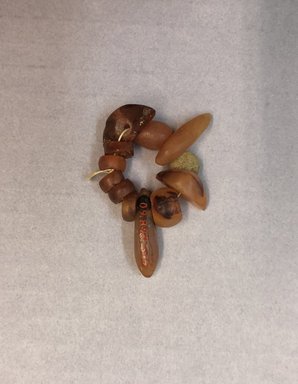  <em>Bracelet</em>. Carnelian, faience, 1 1/2 × 1/2 × 1 5/8 in. (3.8 × 1.2 × 4.2 cm). Brooklyn Museum, Charles Edwin Wilbour Fund, 09.889.303. Creative Commons-BY (Photo: , CUR.09.889.303_view01.jpg)