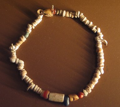  <em>Beaded Necklace</em>, ca. 3300–3100 B.C.E. Shell, faience, carnelian, limestone, lapis lazuli, Largest bead: 5/8 x 3/8 in. (1.6 x 0.9 cm). Brooklyn Museum, Charles Edwin Wilbour Fund, 09.889.304. Creative Commons-BY (Photo: Brooklyn Museum, CUR.09.889.304_erg3.jpg)