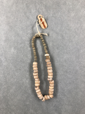  <em>Large Necklace</em>, ca. 4400-3100 B.C.E. Paste, shell, Diam. 1/4 × 8 7/8 in. (0.7 × 22.5 cm). Brooklyn Museum, Charles Edwin Wilbour Fund, 09.889.308. Creative Commons-BY (Photo: , CUR.09.889.308_view01.jpg)