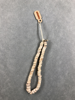  <em>Beads</em>, ca. 4400-3100 B.C.E. Cut shell, Diam. 3/16 × 8 11/16 in. (0.5 × 22 cm). Brooklyn Museum, Charles Edwin Wilbour Fund, 09.889.316. Creative Commons-BY (Photo: , CUR.09.889.316_view01.jpg)