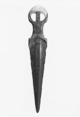  <em>Dagger</em>, ca. 1539–1292 B.C.E. Copper alloy, wood, metal, ivory, and leather, 2 1/4 × 5/8 × 11 3/8 in. (5.7 × 1.6 × 28.9 cm). Brooklyn Museum, Charles Edwin Wilbour Fund, 09.889.339. Creative Commons-BY (Photo: Brooklyn Museum, CUR.09.889.339_NegA_print_bw.jpg)