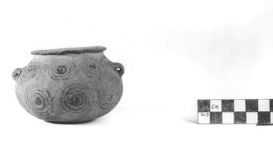  <em>Squat, Wide-mouthed Urn</em>. Terracotta, pigment, 2 3/8 x diam. 3 5/8 in. (6.1 x 9.2 cm). Brooklyn Museum, Charles Edwin Wilbour Fund, 09.889.409. Creative Commons-BY (Photo: Brooklyn Museum, CUR.09.889.409_NegA_print_bw.jpg)