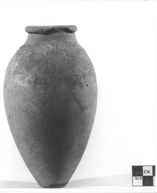  <em>Pointed Shape Vase Decorated with Brown Wavy Lines</em>, ca. 4400-3100 B.C.E. Terracotta, pigment, 6 1/8 x 3 3/8 in. (15.5 x 8.5 cm). Brooklyn Museum, Charles Edwin Wilbour Fund, 09.889.435. Creative Commons-BY (Photo: Brooklyn Museum, CUR.09.889.435_NegA_print_bw.jpg)