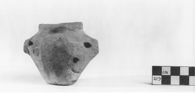  <em>Coarse Vase with Handles</em>, ca. 3500–3300 B.C.E. Terracotta, 2 9/16 x 3 3/16 in. (6.5 x 8.1 cm). Brooklyn Museum, Charles Edwin Wilbour Fund, 09.889.458. Creative Commons-BY (Photo: Brooklyn Museum, CUR.09.889.458_NegA_print_bw.jpg)
