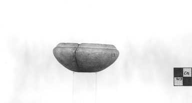  <em>Flat Cup</em>, ca. 3100-2675 B.C.E. Egyptian alabaster (calcite), 1 1/4 x greatest diam. 2 7/8 in. (3.1 x 7.3 cm). Brooklyn Museum, Charles Edwin Wilbour Fund, 09.889.48. Creative Commons-BY (Photo: Brooklyn Museum, CUR.09.889.48_NegA_print_bw.jpg)