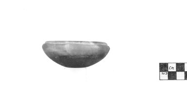  <em>Flat Cup</em>, ca. 3100-2625 B.C.E. Egyptian alabaster (calcite), 1 1/4 x greatest diam. 3 1/8 in. (3.1 x 7.9 cm). Brooklyn Museum, Charles Edwin Wilbour Fund, 09.889.49. Creative Commons-BY (Photo: Brooklyn Museum, CUR.09.889.49_NegA_print_bw.jpg)