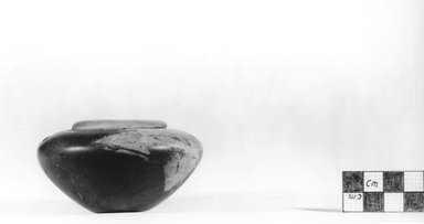  <em>Small Urn</em>, ca. 2675-2625 B.C.E. Limestone, 1 13/16 x Greatest Diam. 3 3/16 in. (4.6 x 8.1 cm). Brooklyn Museum, Charles Edwin Wilbour Fund, 09.889.4. Creative Commons-BY (Photo: Brooklyn Museum, CUR.09.889.4_NegA_print_bw.jpg)