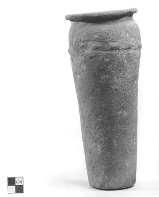  <em>Wavy-handled Jar</em>, ca. 3200-3100 B.C.E. Terracotta, 8 13/16 x diam. 3 1/2 in. (22.4 x 8.9 cm). Brooklyn Museum, Charles Edwin Wilbour Fund, 09.889.618. Creative Commons-BY (Photo: Brooklyn Museum, CUR.09.889.618_NegA_print_bw.jpg)