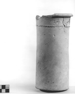  <em>Cylindrical Vase</em>. Terracotta, Height: 8 1/16 in. (20.4 cm). Brooklyn Museum, Charles Edwin Wilbour Fund, 09.889.674. Creative Commons-BY (Photo: Brooklyn Museum, CUR.09.889.674_NegA_print_bw.jpg)