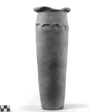  <em>Wavy Handled Cylindrical Vase</em>, ca. 4400-3100 B.C.E. Terracotta, 12 13/16 x 4 5/16 in. (32.5 x 11 cm). Brooklyn Museum, Charles Edwin Wilbour Fund, 09.889.680. Creative Commons-BY (Photo: Brooklyn Museum, CUR.09.889.680_NegA_print_bw.jpg)